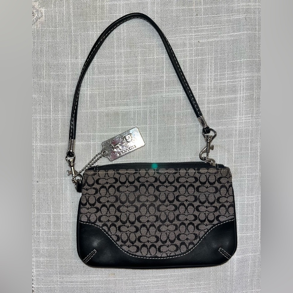 Coach black canvas and leather wristlet